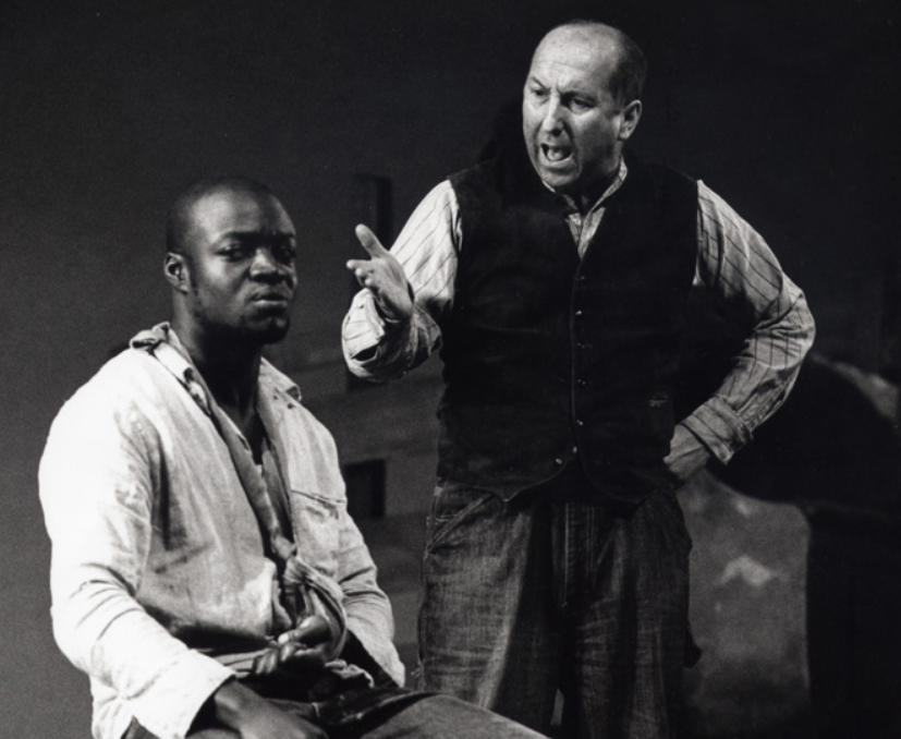 Enoch Frost as Tom Robinson and John Biggins as Prosecutor Gilmer in a Theatre Clewyd production of 'To Kill a Mockingbird'.