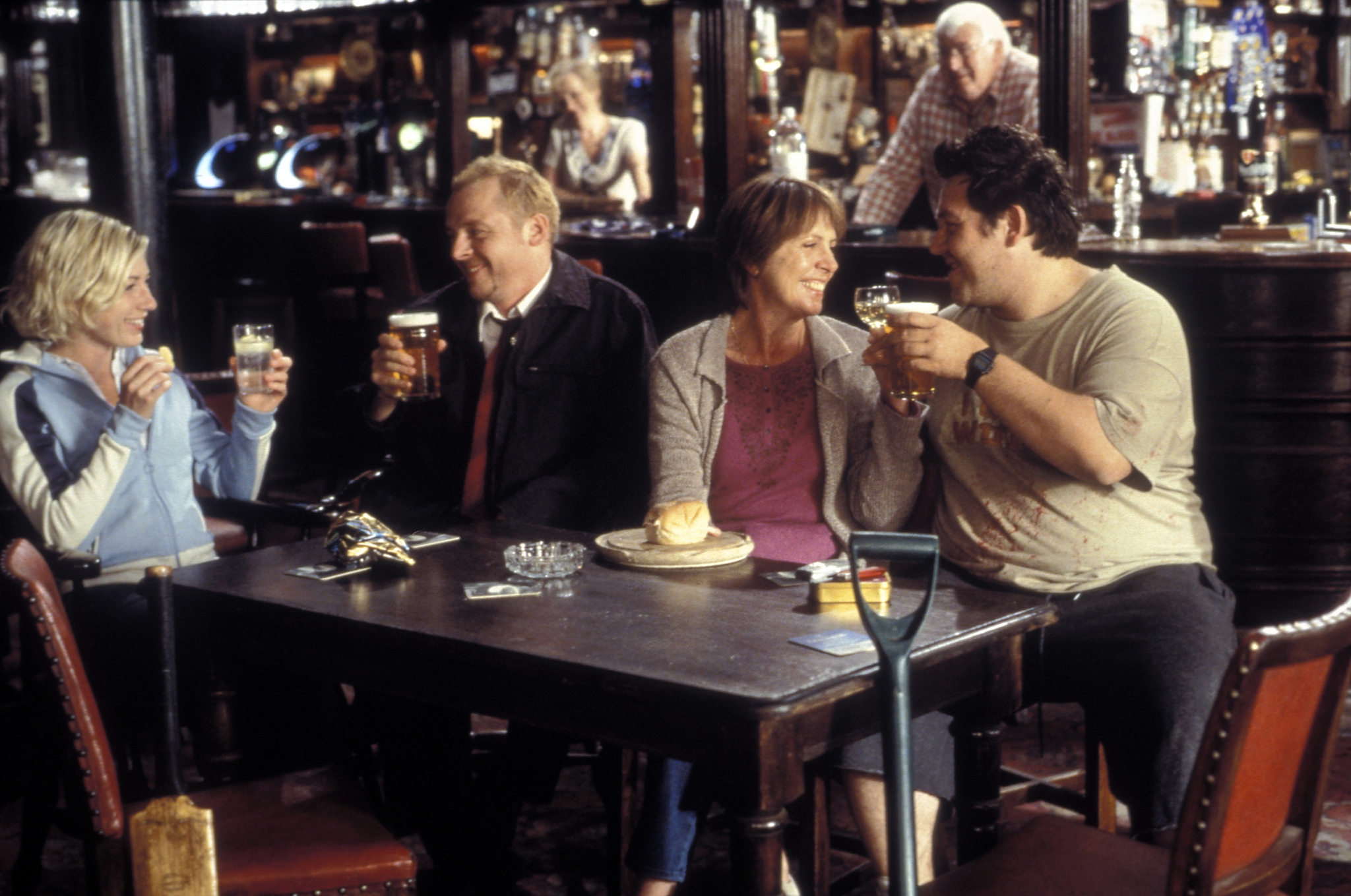 Still of Kate Ashfield, Nick Frost, Simon Pegg and Penelope Wilton in Shaun of the Dead (2004)