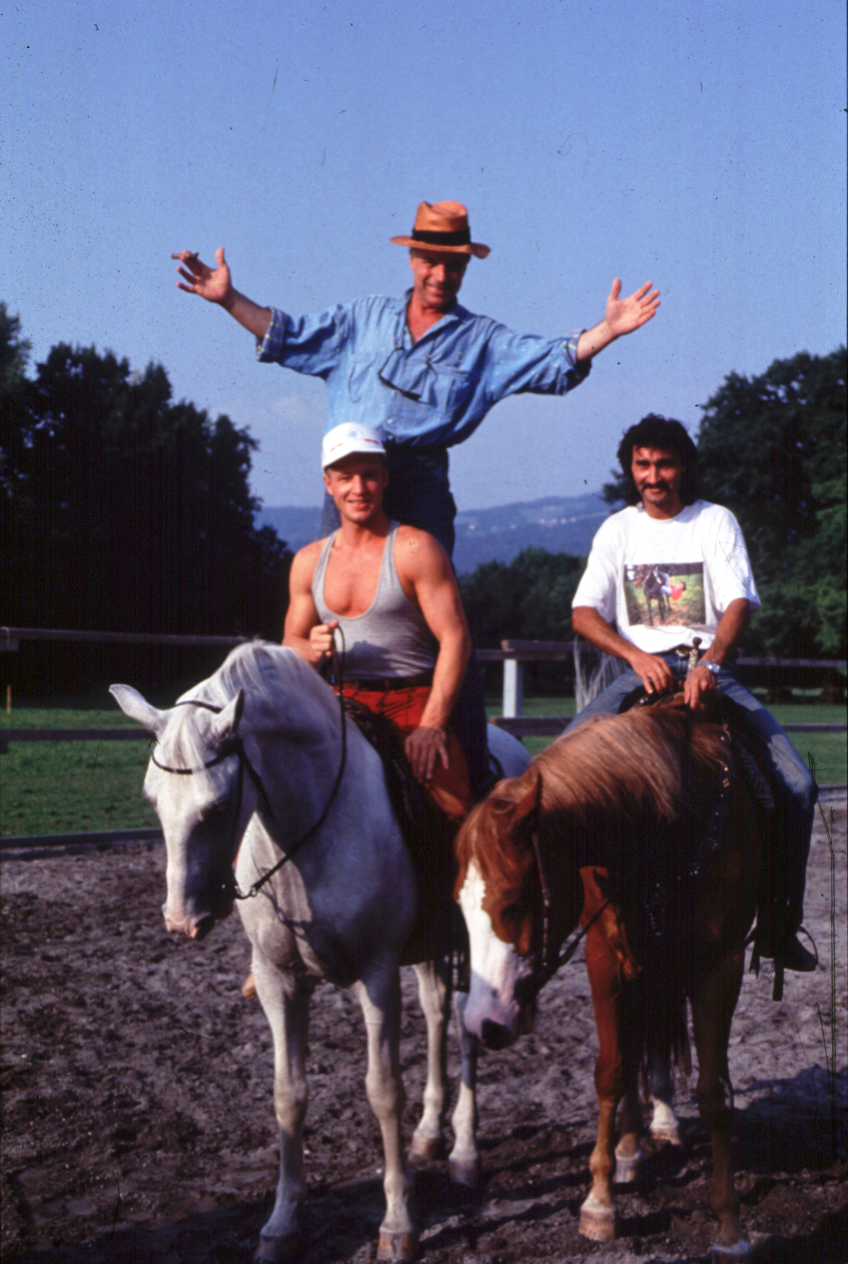 Foehrweisser as Coordinator, Fight Director & Performer, here with the Shows Director Jereome Savary standing on the back of Guido's horse, during a rehearsal for the Opera 