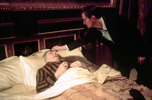 Eden (Benno Fürmann) prepares dying British aristocrat Burnham (Jon Laurimore) for the Sin Eating ritual.
