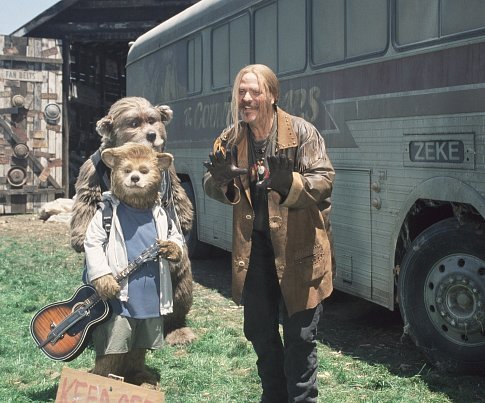 Beary (foreground, left) finds new friends in the Bears' manager, Henry (background left), and Roadie (M.C. Gainey, right).