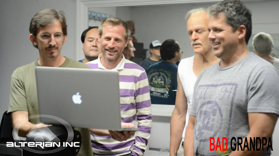 Makeup Effects Designer Tony Gardner reviews footage with (L to R) Producer Spike Jonze, Actor Johnny Knoxville (in 
