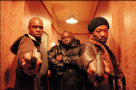 Tom Delmar Stunt Coordinator & Action Director. Robbie Gee, Ade & Lennie James ( Vincent, Tyrone & Sol ) in Guy Ritchie's 'Snatch'.jpg