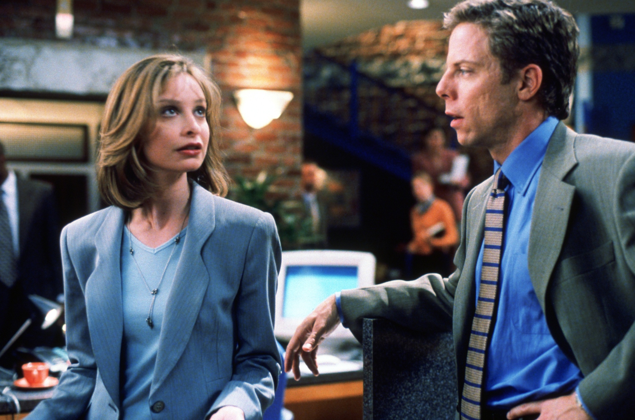 Still of Calista Flockhart and Greg Germann in Ally McBeal (1997)