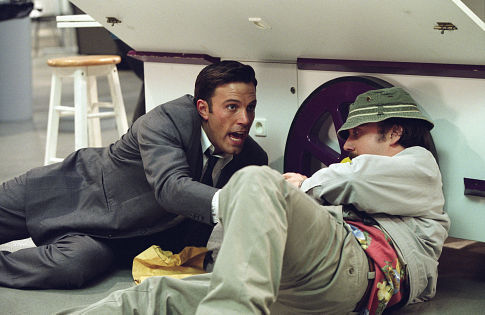 Still of Ben Affleck and Paul Giamatti in Paycheck (2003)