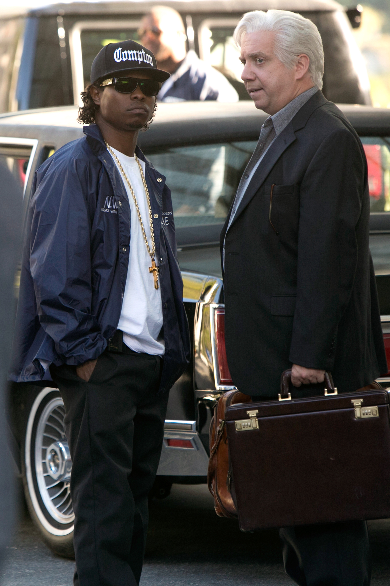 Still of Paul Giamatti and Jason Mitchell in Straight Outta Compton (2015)
