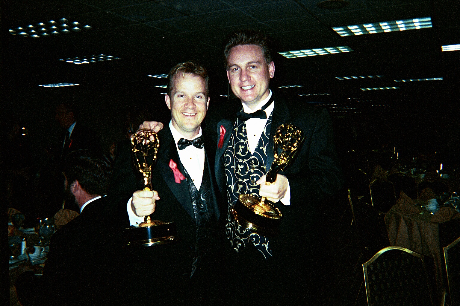 John Gilbert, a.c.e. and Roderick Davis celebrate their Emmy win.