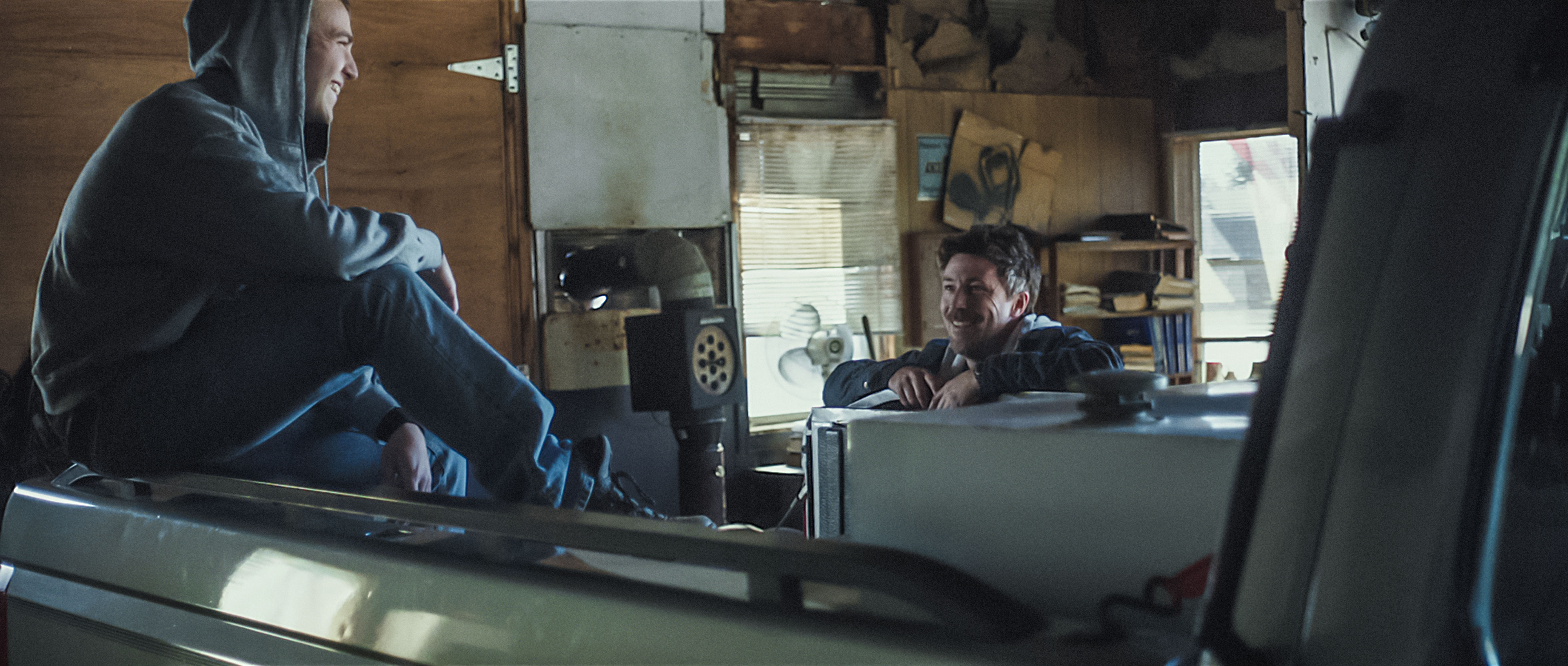 Still of Aidan Gillen and Emory Cohen in Beneath the Harvest Sky (2013)