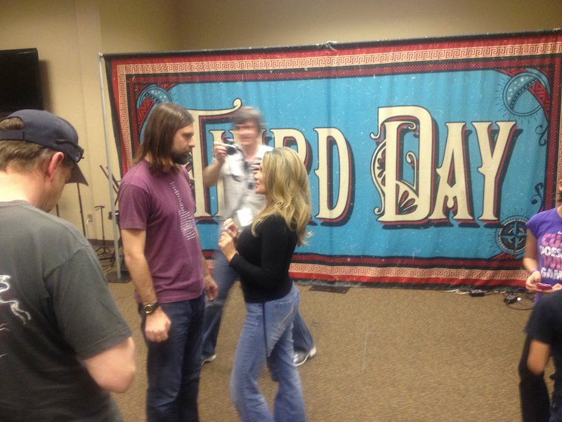 Dr. Lisa Christiansen consulting lead singer Mac Powell of Third Day