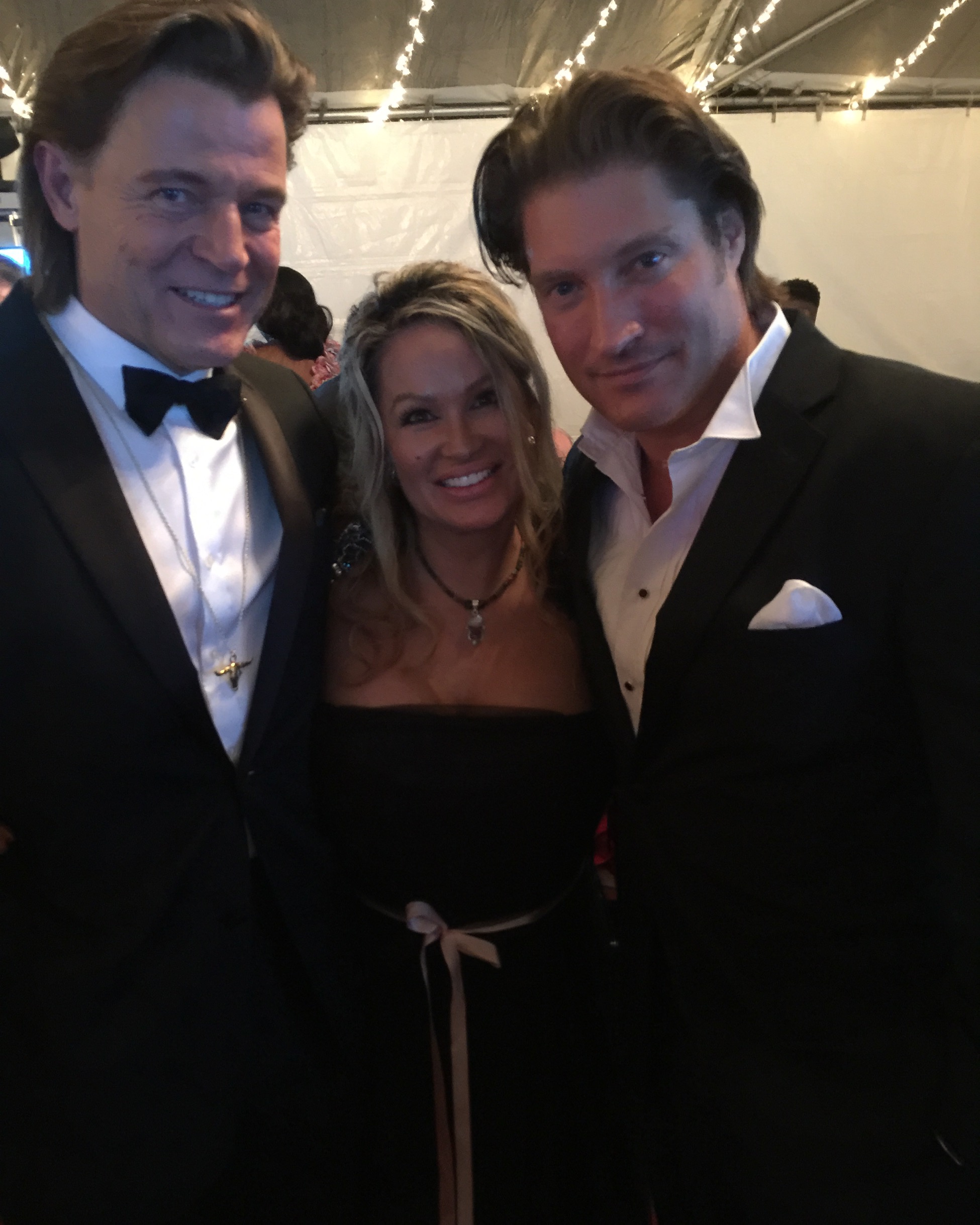 Brett Stimely, Lisa Christiansen and Sean Kanan at the Oscars Private Party hosted at the Warner Bro. Estate.