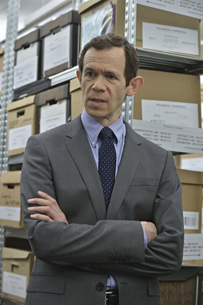 Still of Adam Godley in Suits (2011)