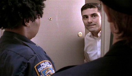 Kip (Robert Gomes) gets a visit from New York's Finest.