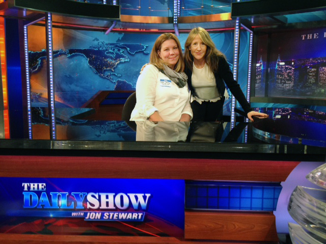 Behind Jon Stewart's historic desk with friend and colleague producer Donna Smealand after participating in 