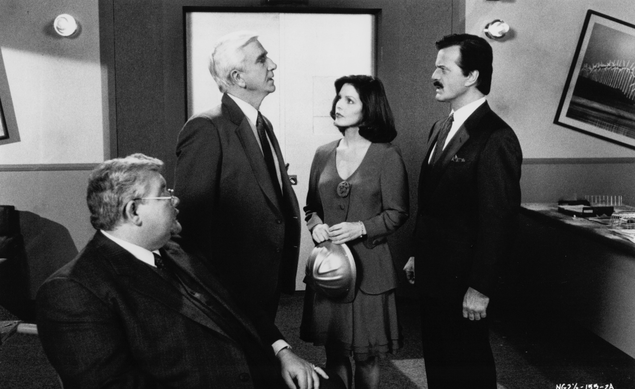 Still of Leslie Nielsen, Priscilla Presley, Robert Goulet and Richard Griffiths in The Naked Gun 2½: The Smell of Fear (1991)