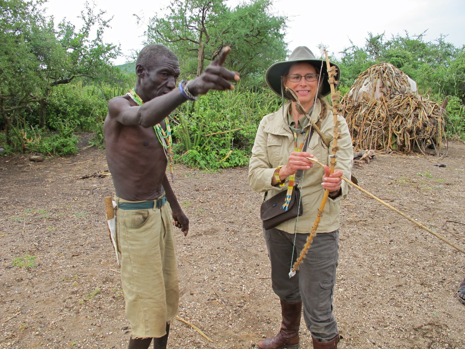 Morongo Tribe elder teaching me bow and arrow, Tanzania