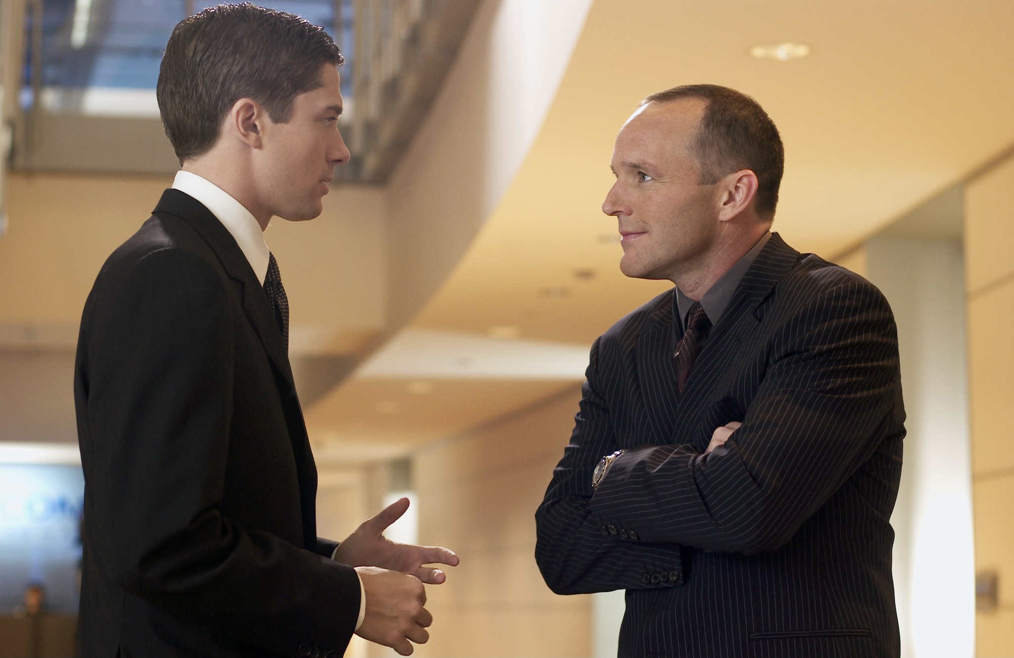 Still of Clark Gregg and Topher Grace in In Good Company (2004)