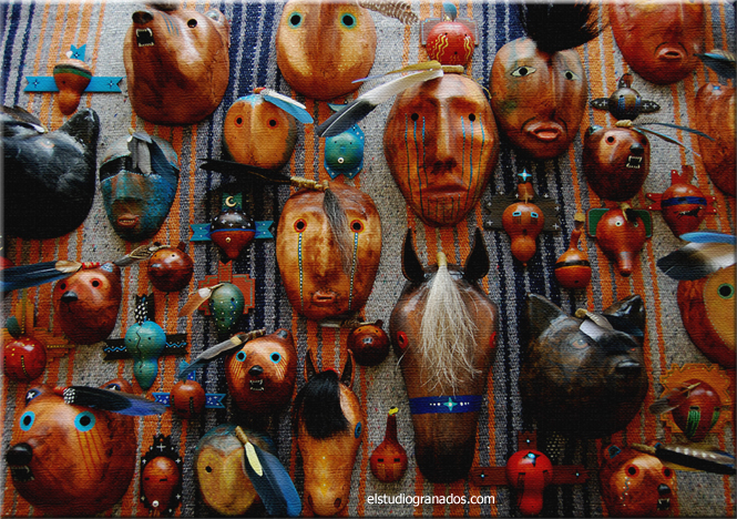Sampling of mixed-media masks by Bernie Granados Jr. These are constructed of plaster-roll,gourds,painted with acrylics, and decorated with horsehair,wood, beads, antler, feathers, leather, and shells.