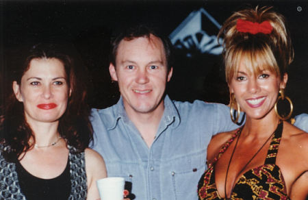 John Fox with Jane Badler (left) and Judy Green (right) on the set of 