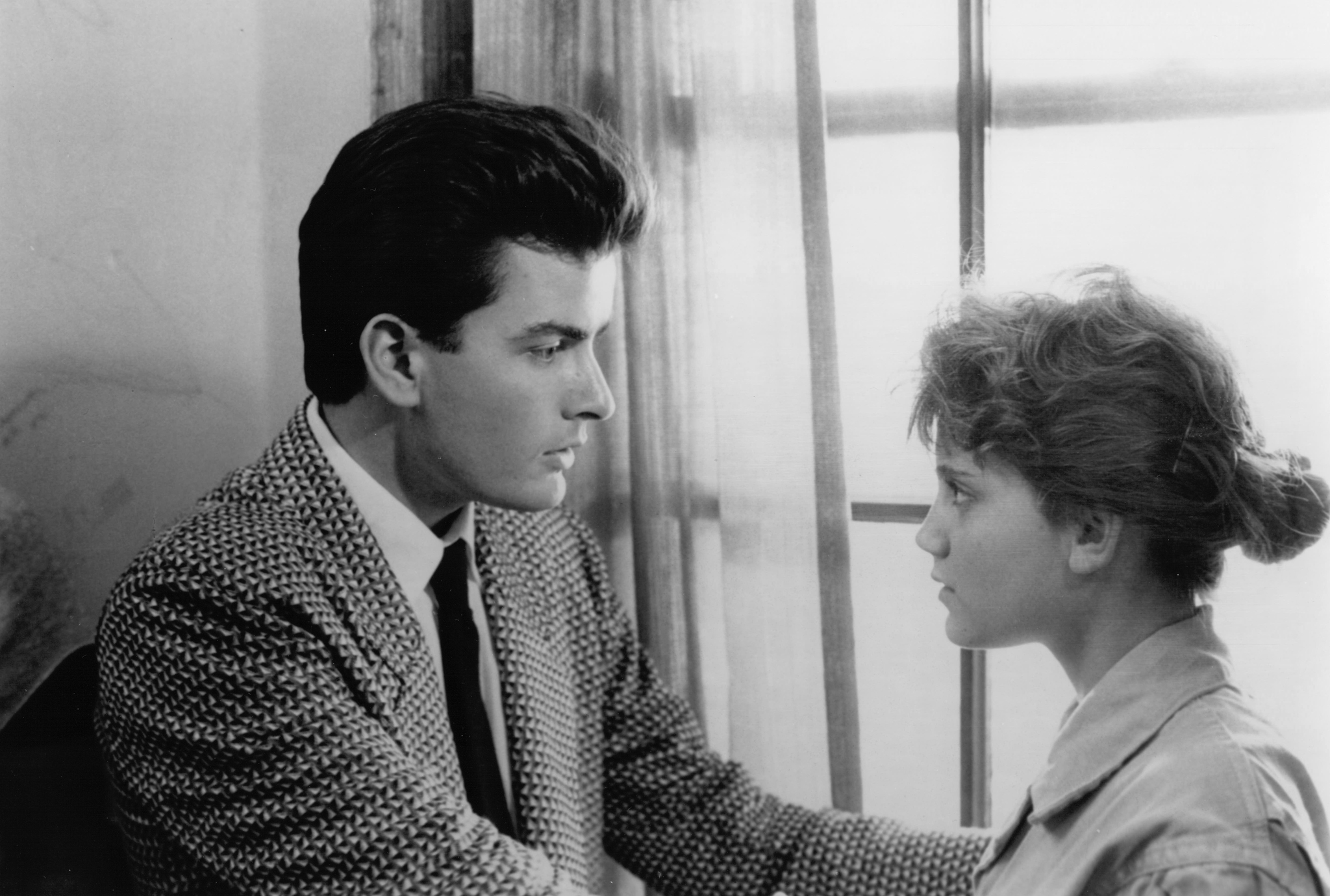 Still of Charlie Sheen and Kerri Green in Three for the Road (1987)