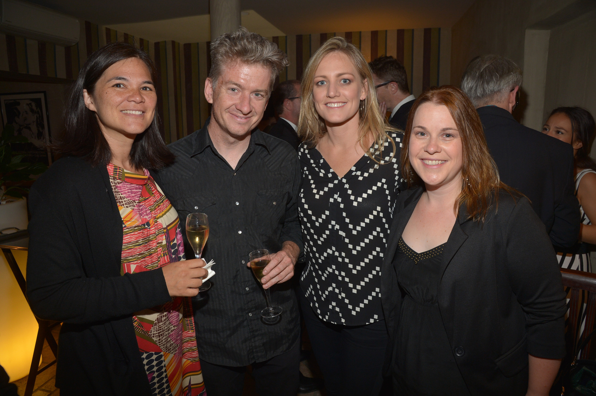 Laura Smith (2nd R) and Rebecca Green (R) attend IMDb's 2014 Cannes Film Festival Dinner Party at Restaurant Mantel on May 19, 2014 in Cannes, France.