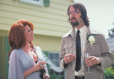 Still of Megan Mullally and Tom Green in Stealing Harvard (2002)