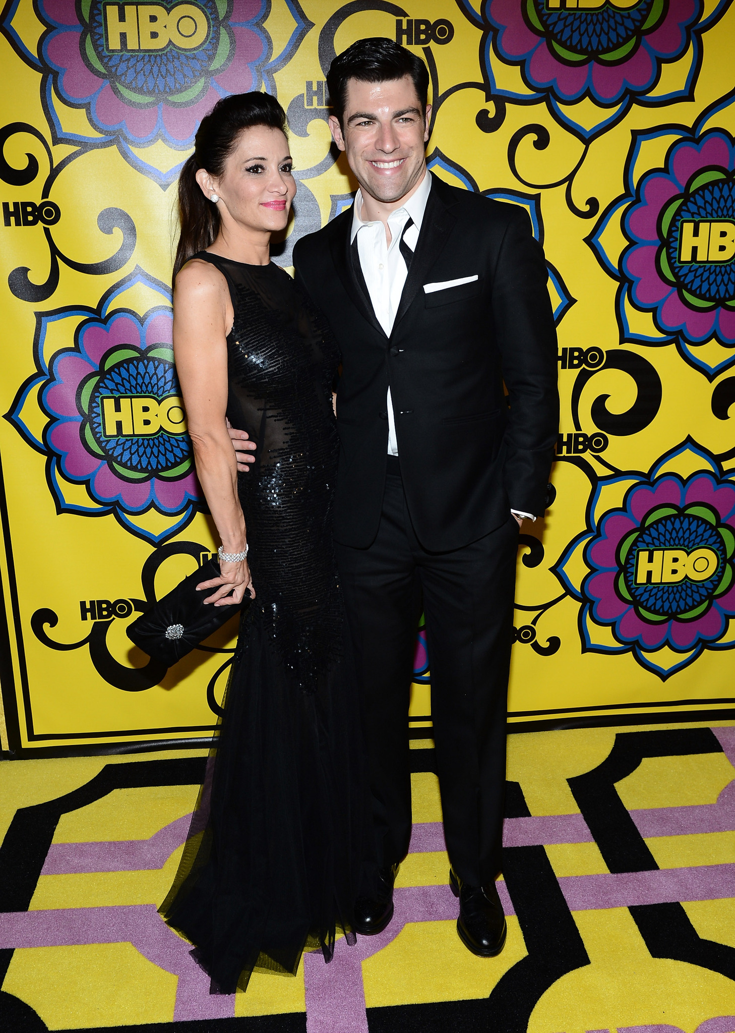 Max Greenfield and Tess Sanchez at event of The 64th Primetime Emmy Awards (2012)