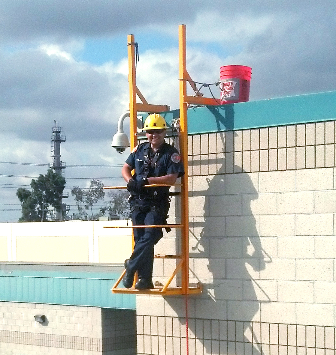 Designed and fabricated a parapet ladder to hang off the side of the building to install security cameras.