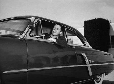 Merv Griffin in his Ford Capri C. 1950