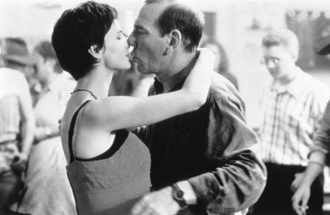 Still of Pete Postlethwaite and Rachel Griffiths in Among Giants (1998)