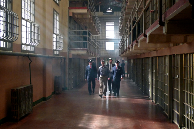 Jeffrey Pierce and Jason Butler Harner walking towards cellblock D - Built on stage in Vancouver for 