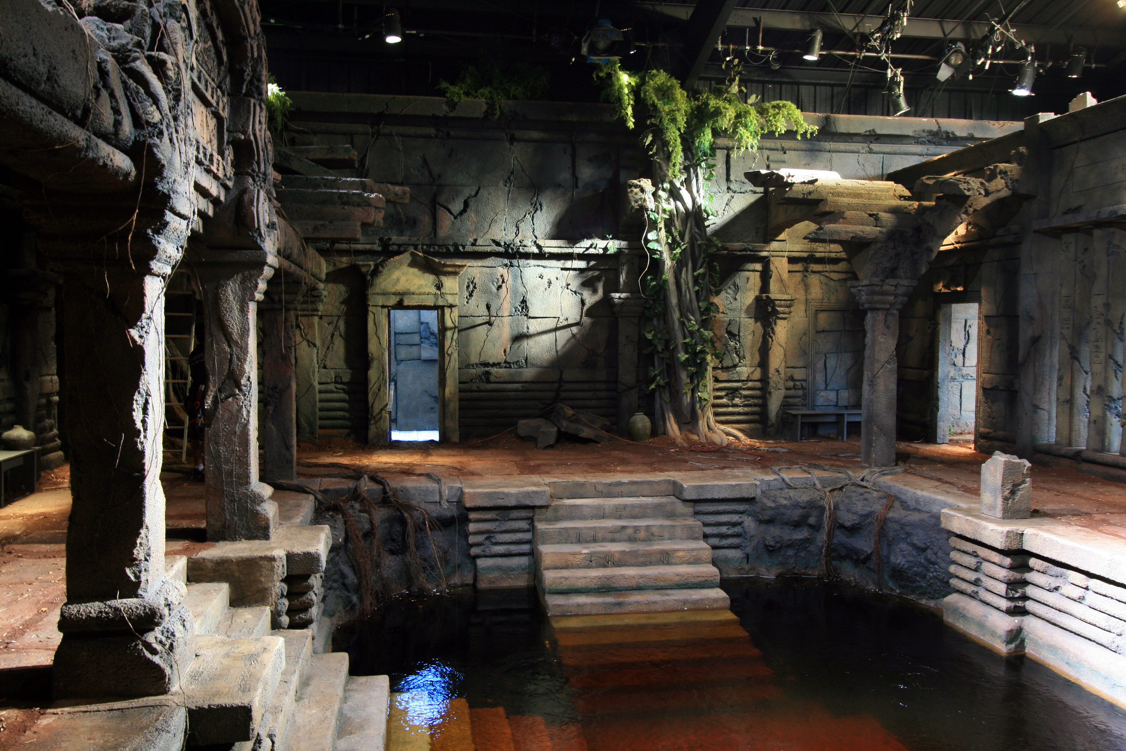 Temple interior with healing pool, built on stage for 