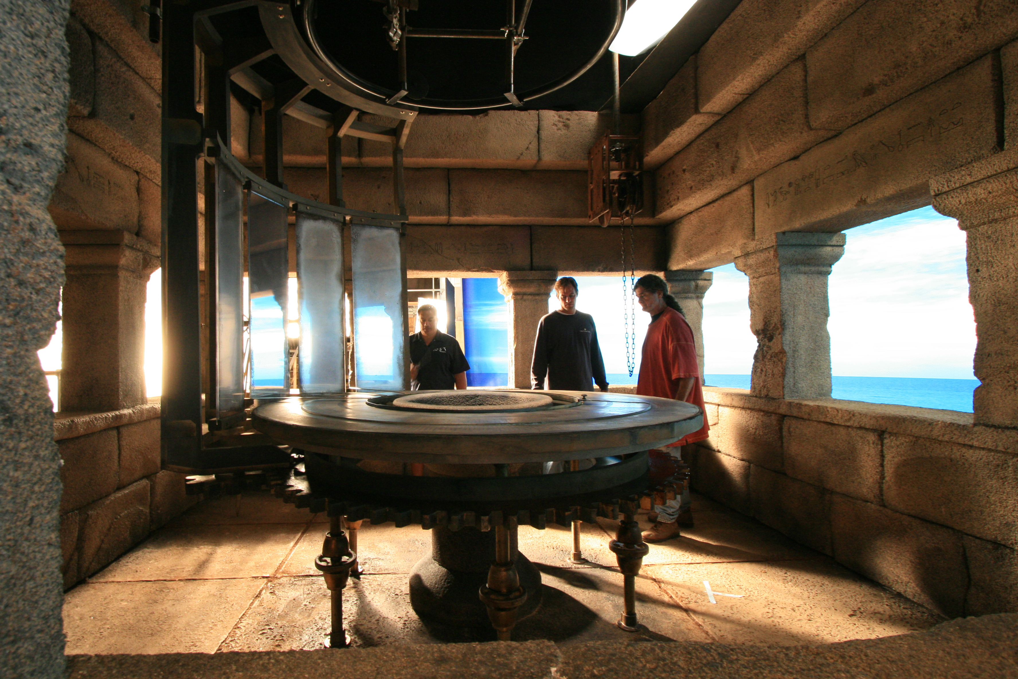 Ancient lighthouse with rotating array of mirrors. Built on stage with translight backing for 