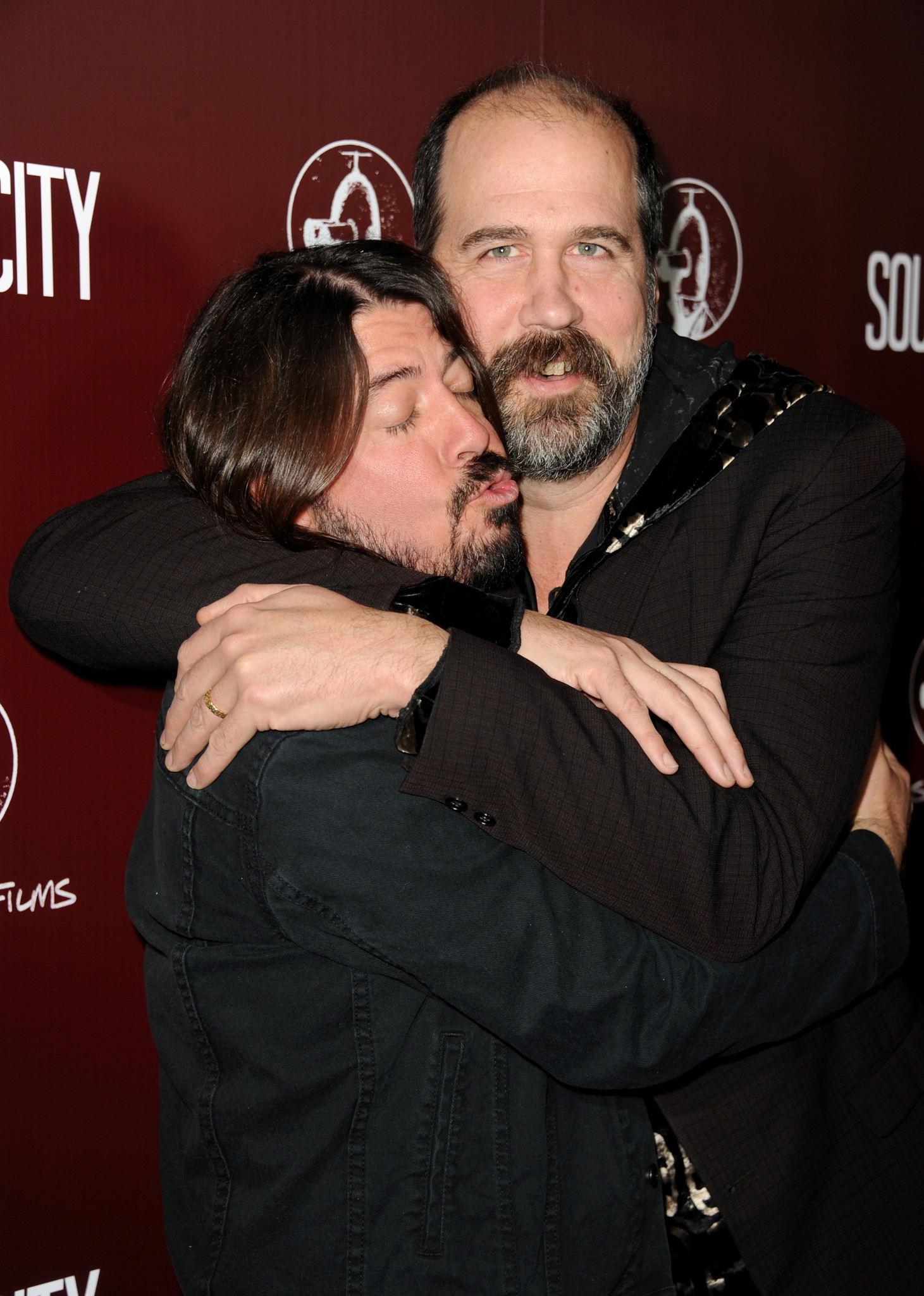 Dave Grohl and Krist Novoselic arrive at the premiere of 