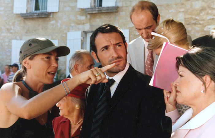 Valérie Guignabodet et Jean Dujardin sur le tournage de 