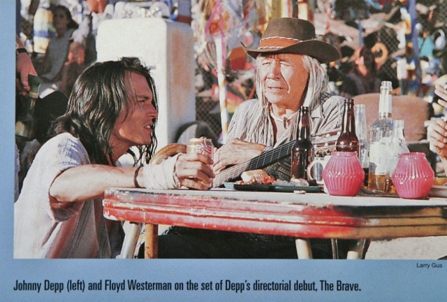 Johnny Depp giving direction to Floyd Redcrow Westerman, on the set of The Brave directed by Johnny Depp.