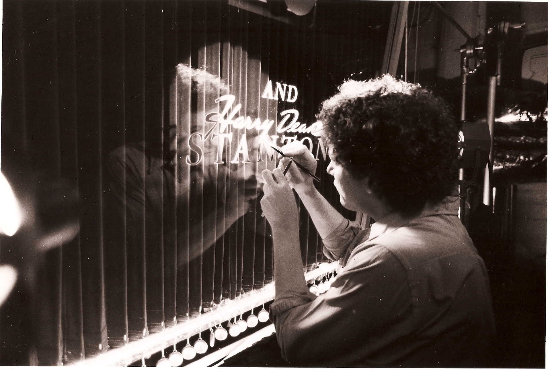 One From The Heart - Gary touches up title art on miniature curtain set