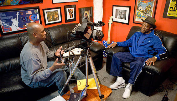 Art Holliday interviewing Buddy Guy