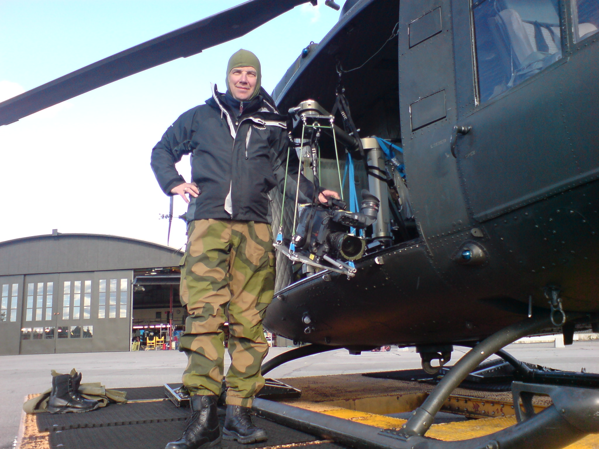 From aerial shooting with Bell chopper from the Norwegian Air Force at Rygge Airfield for Lange Flate Ballær. Note high end grip bungee strapping of camera.