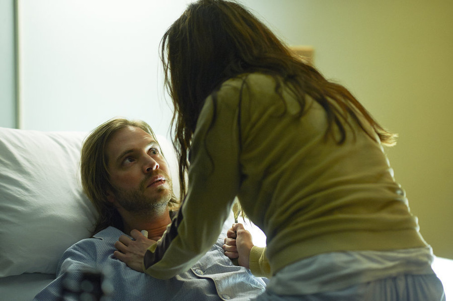 Still of Emily Hampshire and Aaron Stanford in 12 Monkeys (2015)