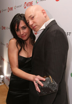 Evan Handler and Pamela Adlon at event of The 66th Annual Golden Globe Awards (2009)