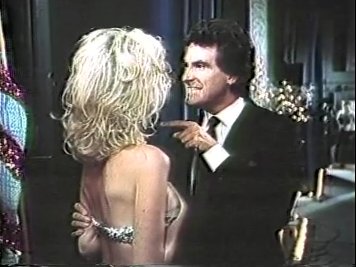 TV, ABC Movie of the Week I MARRIED A CENTERFOLD - as Roger Evans (Hugh Hefner), seen here with actress Teri Copley