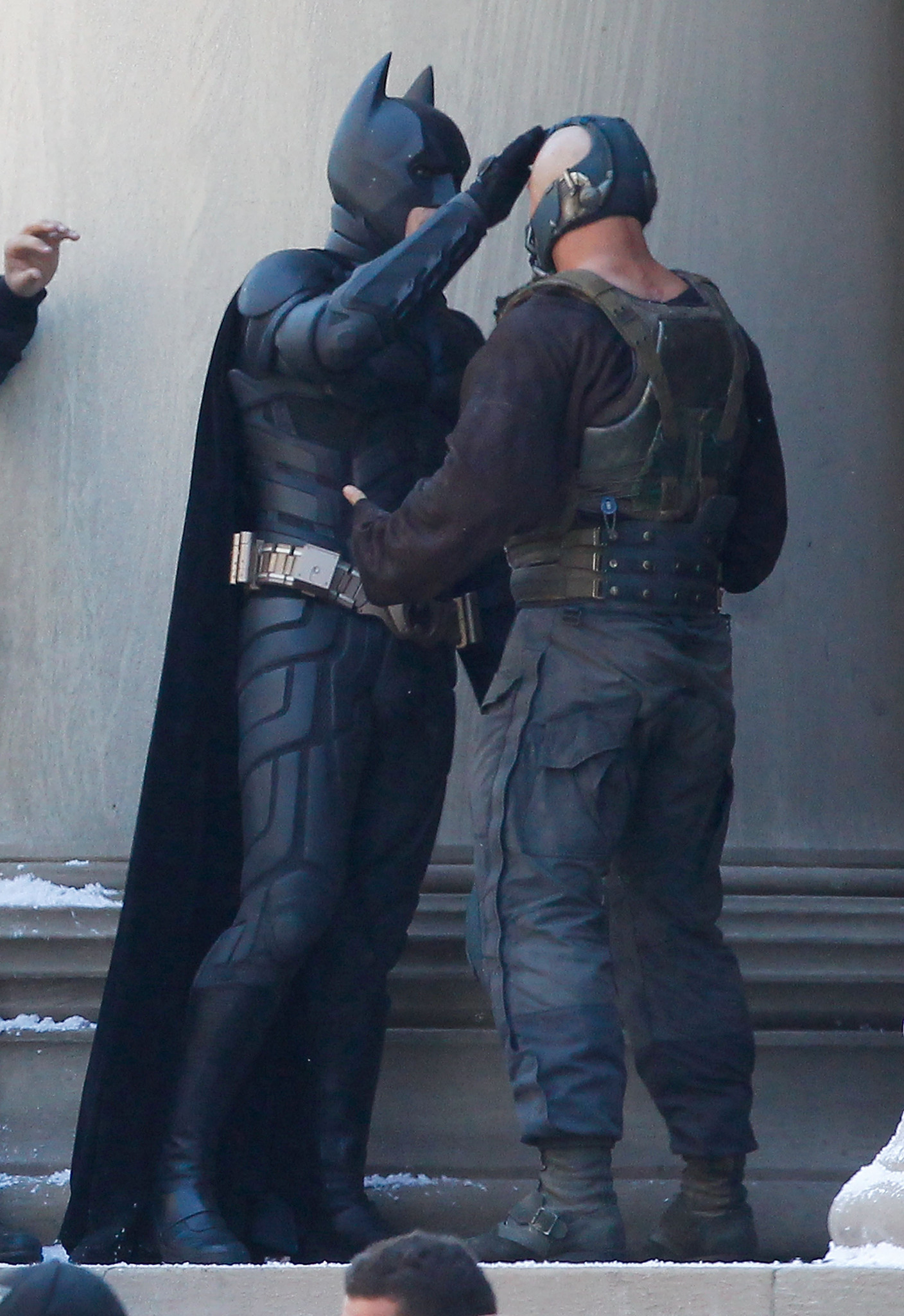 Christian Bale and Tom Hardy in between scenes during the filming of The Dark Knight Rises.