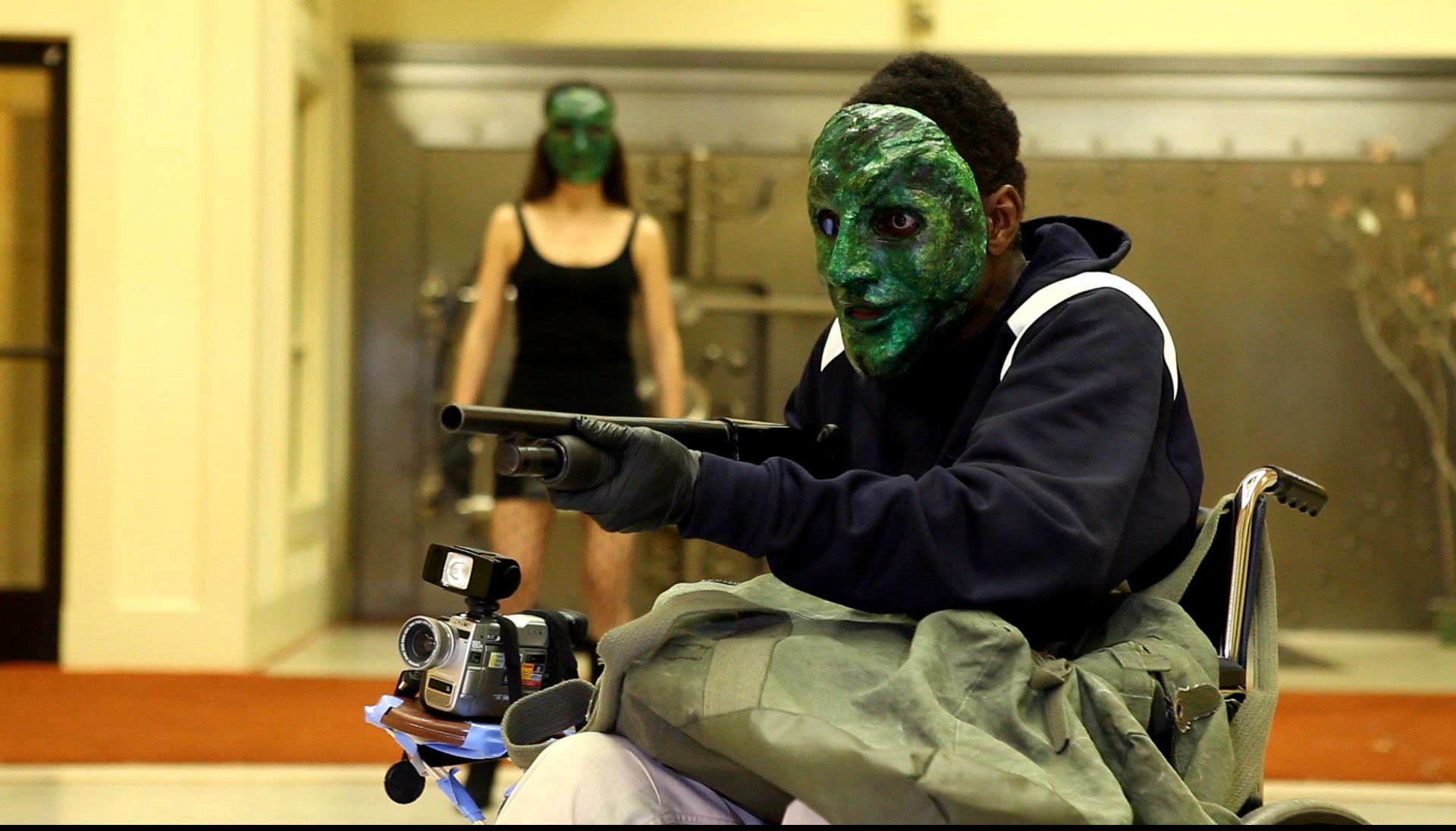 Green Bandits, on location during the bank robbery scene. Gift and Gina take control.