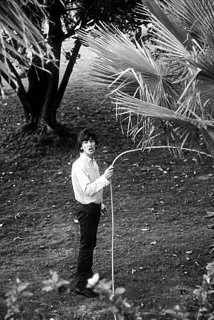 George Harrison watering the plants