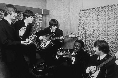 The Beatles (Ringo Starr, Paul McCartney, George Harrison, and John Lennon) with Fats Domino c. 1964