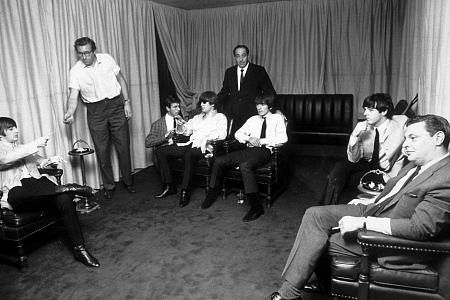 The Beatles (Ringo Starr, John Lennon, George Harrison, & Paul McCartney with manager B. Epstein) c. 1964