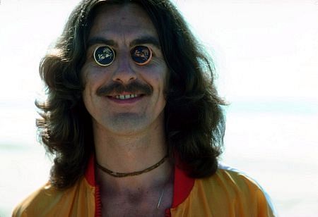 Gerge Harrison sporting a mustache and eyecovers in Acapulco, January 1977