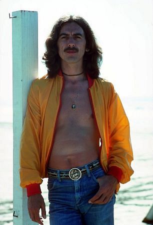 George Harrison in Acapulco sporting blue jeans and a windbreaker January 1977