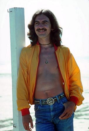 George Harrison in Acapulco sporting blue jeans and a windbreaker January 1977