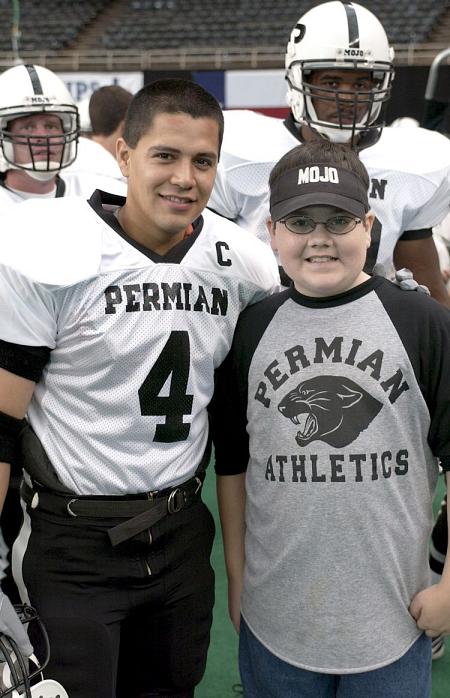 Taylor on the set with Jay Hernandez.